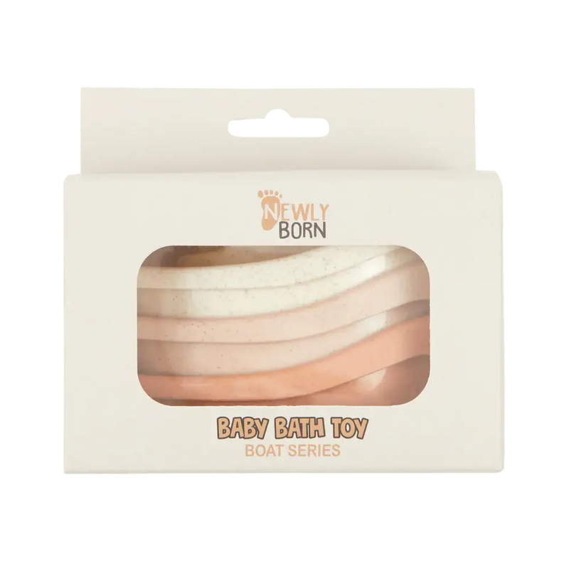 Packaged baby bath toy boat series in blush color, labeled as 'Make a Splash Bathtime Boat Toys'.