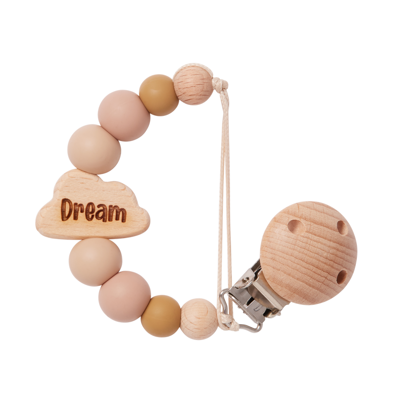 Personalised Cloud Dummy Clip in Beige with 'Dream' engraving on a white background