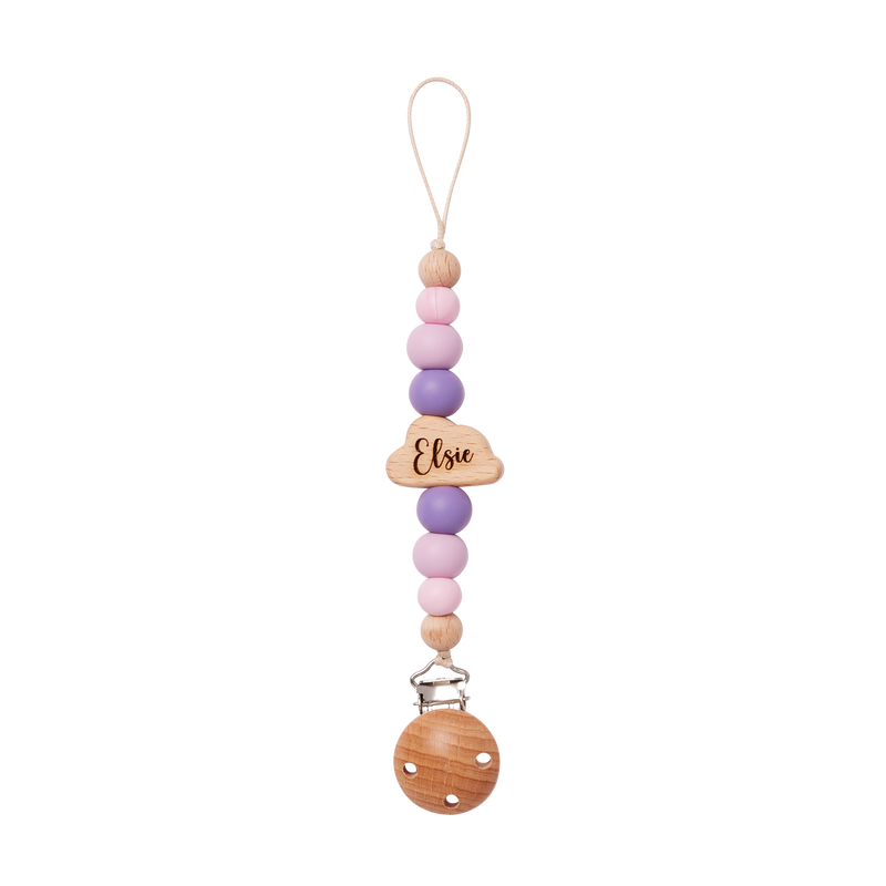 Colorful beaded pacifier clip in purple with a wooden tag engraved 'Elise' on a white background