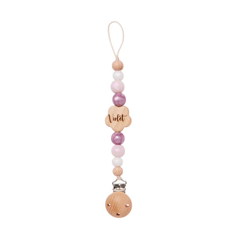 Beaded pacifier clip with wooden heart charm and 'Violet' engraving on a white background