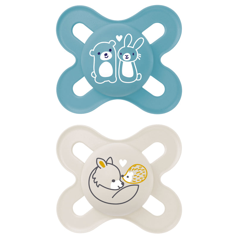 Two baby pacifiers with animal illustrations on a white background