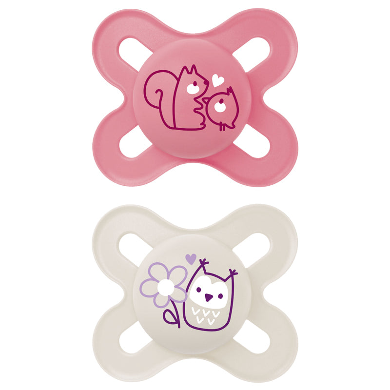 Two baby pacifiers, one pink and one beige, with cartoon designs on a white background.