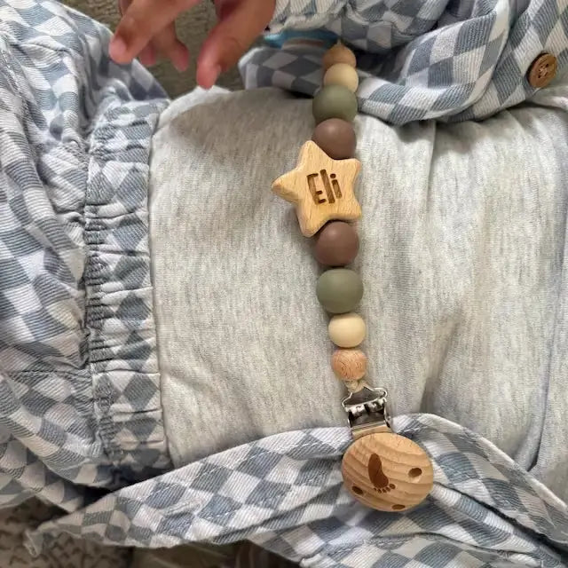 Wooden pacifier clip with beads and engraved name