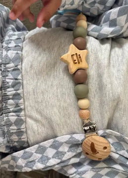 Wooden pacifier clip with beads and engraved name