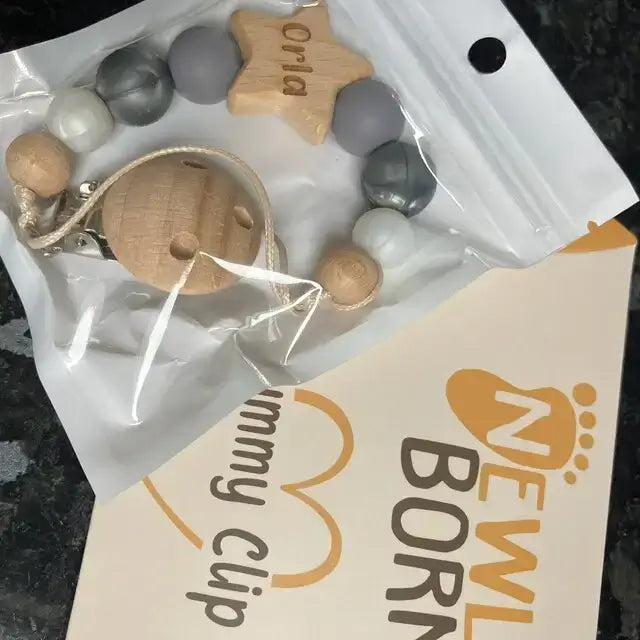 Personalised star dummy clip in Grey with packaging 5 star review from customer