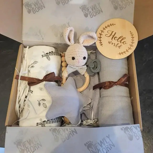Newborn baby gift set with toys and blanket in a box personalised